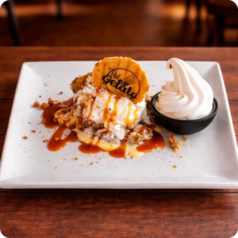 caramel waffle with ice cream and sauce served at Hot Gelato Eastbourne